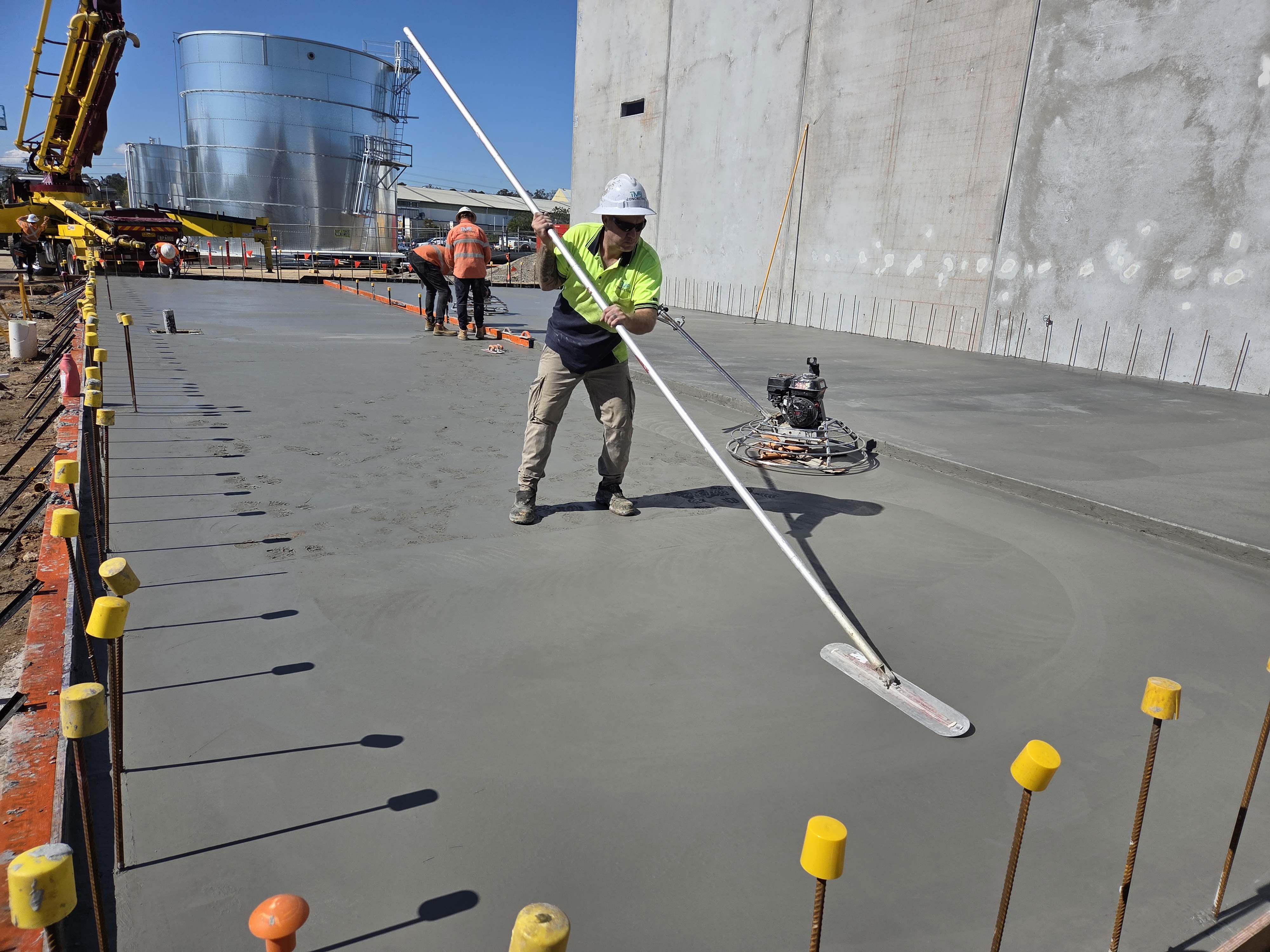 Century Batteries — acid tank slab finishing