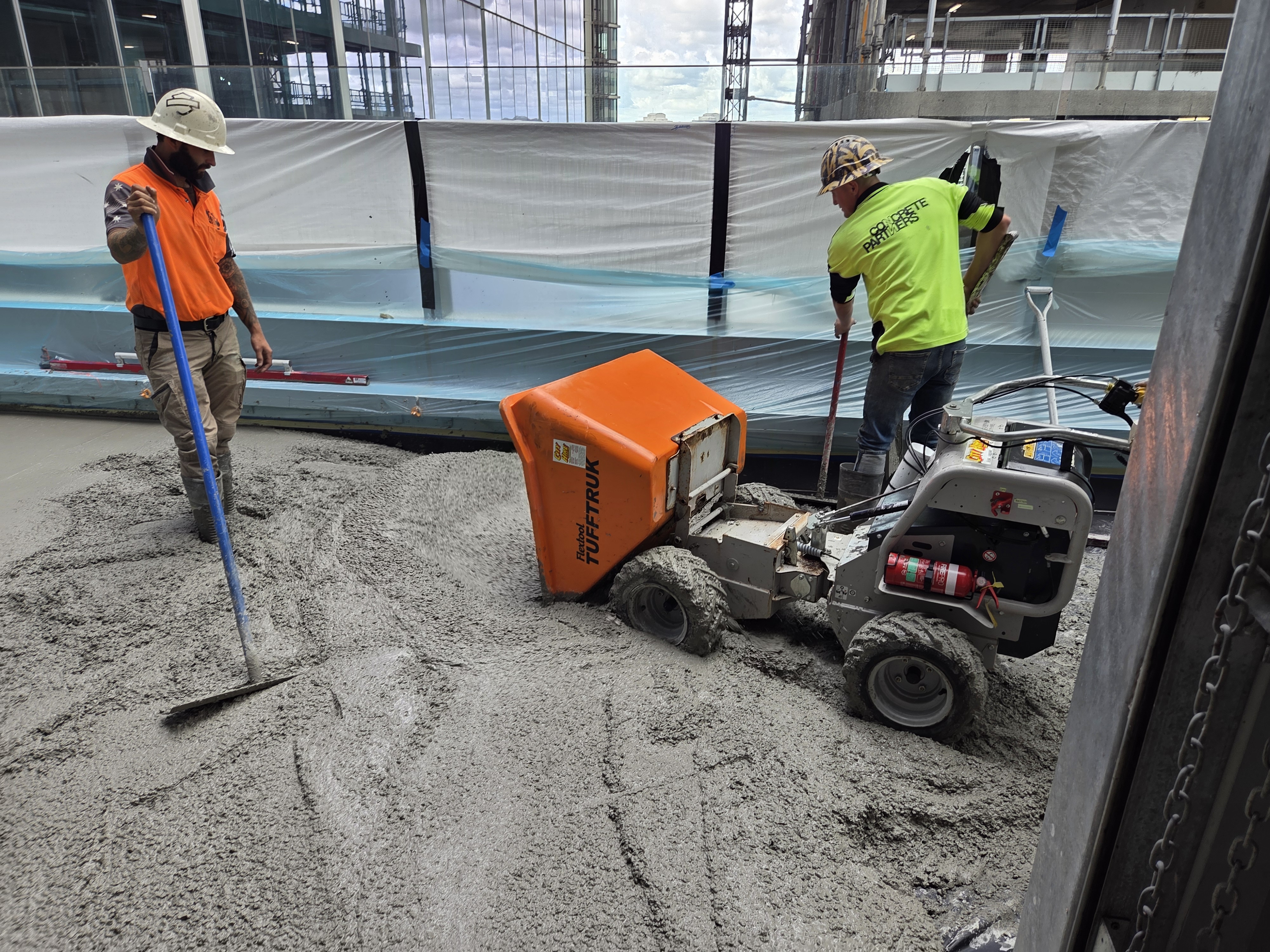 Queen St — concrete placement with Tuff-Truk on roof