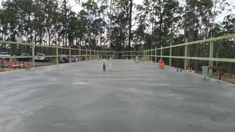 Watertank — completed slab with timber framing