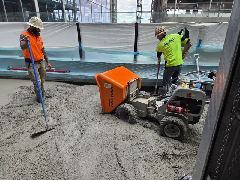 Queen St — concrete placement with Tuff-Truk on roof