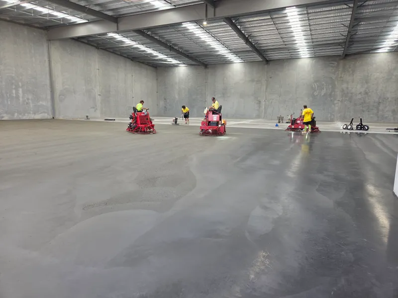 Industrial slab — power trowelling team