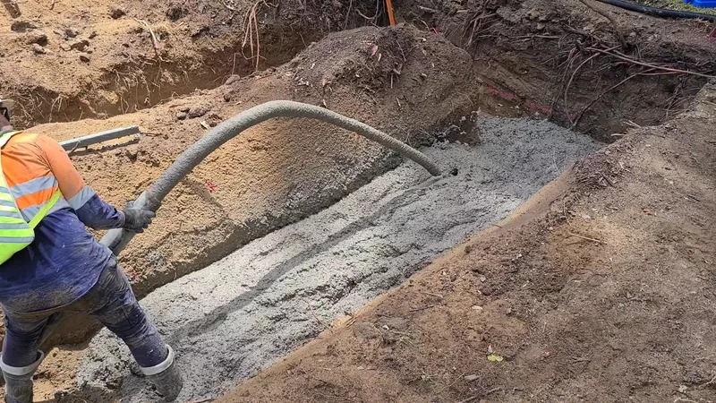 Grammar College — pumping SteelX concrete into footing